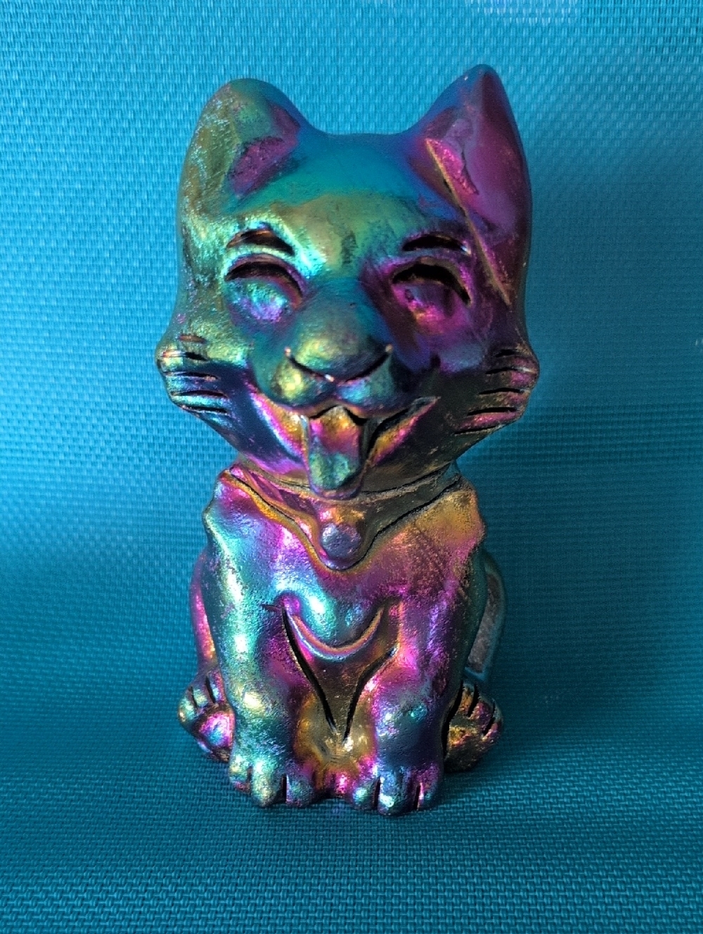 Carved stone cat titanium aura (big)